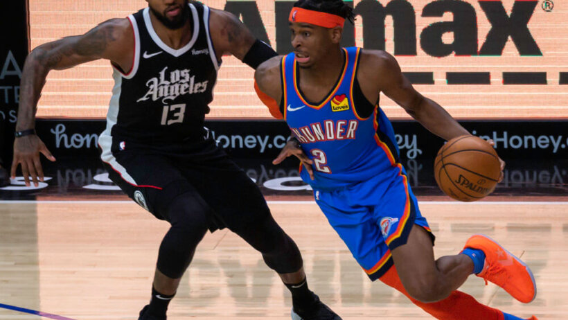 Shai Gilgeous-Alexander dribbling a basketball