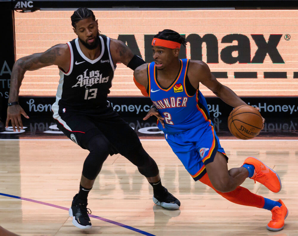 Shai Gilgeous-Alexander dribbling a basketball