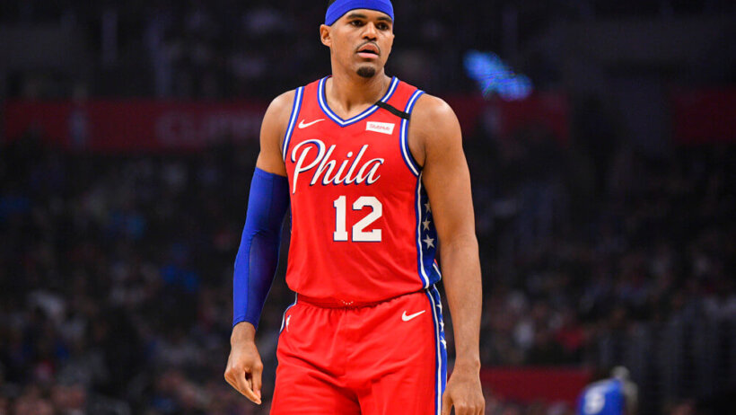 Tobias Harris rests during a stoppage in play