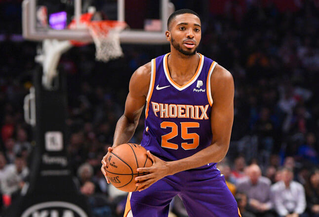 Mikal Bridges holding ball at top of key