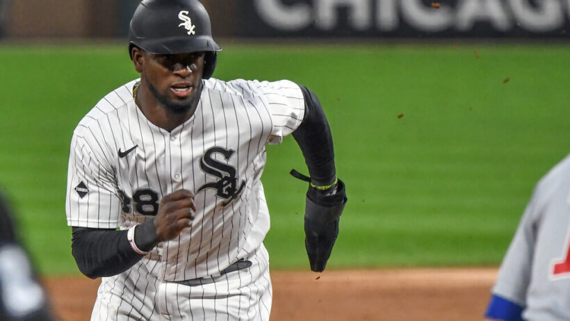 Chicago White Sox outfielder Luis Robert runs to 3rd