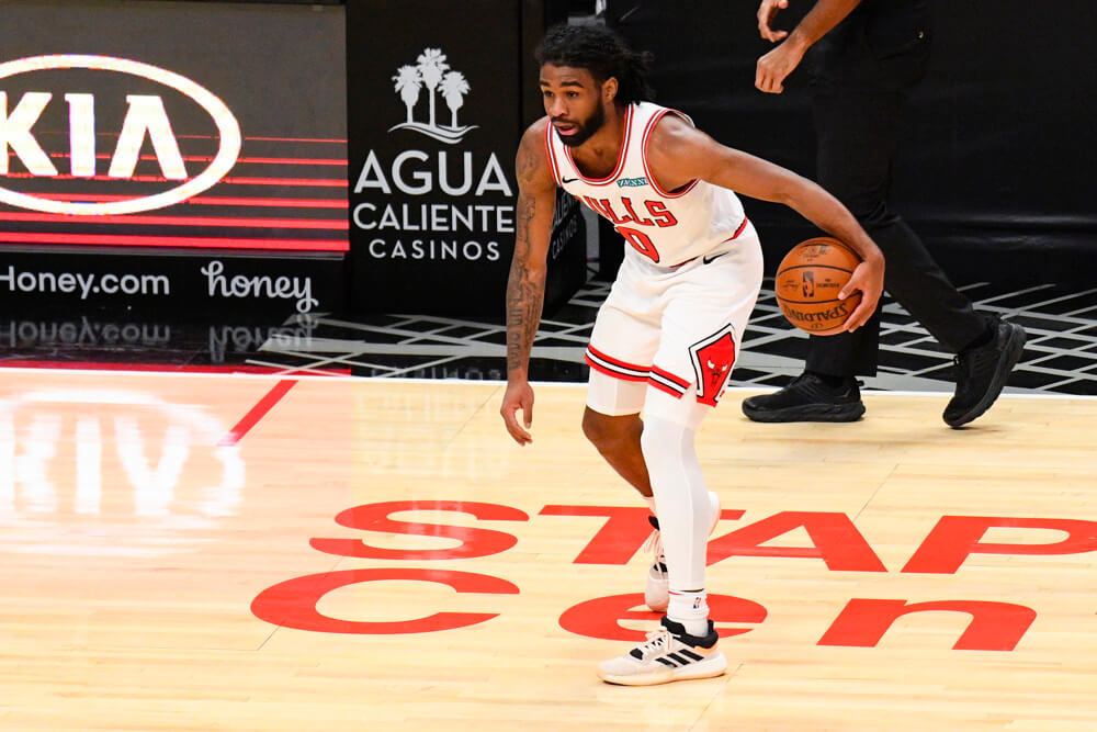 Coby White dribbling