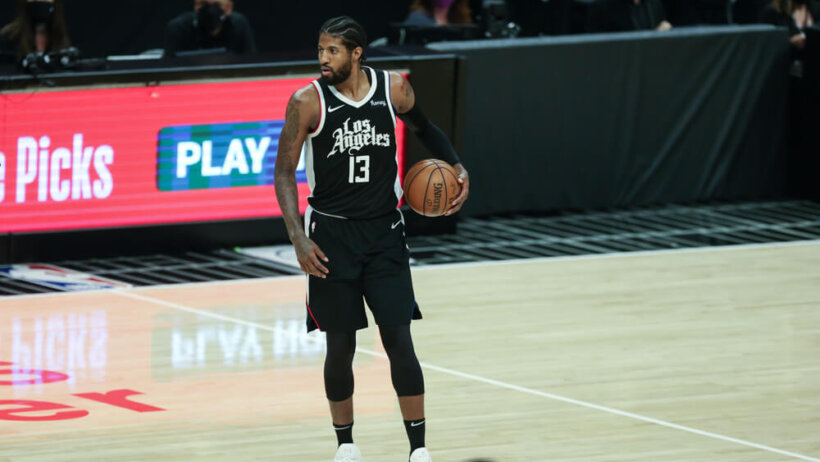 Paul George holding ball at halfcourt