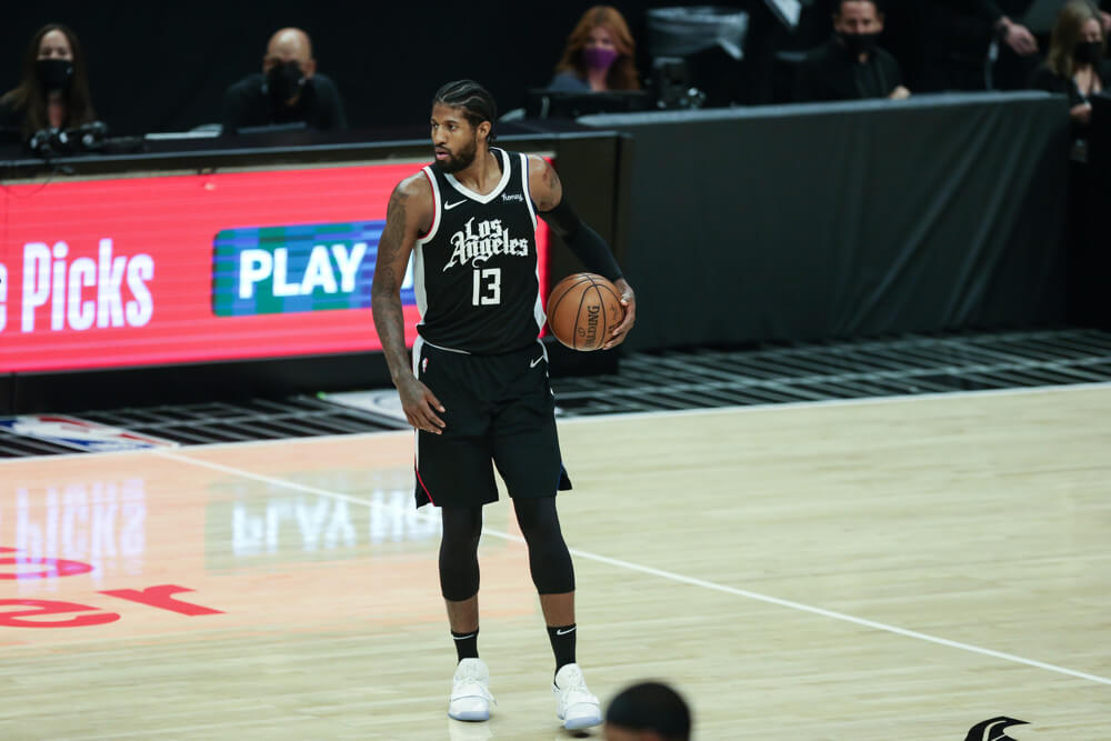 Paul George holding ball at halfcourt