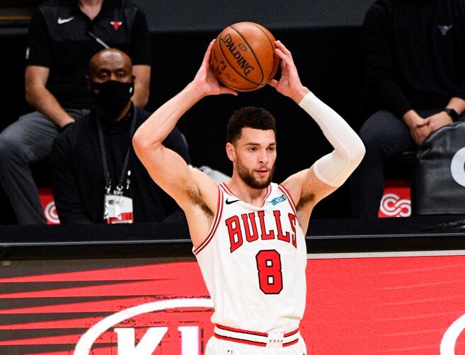 Zach LaVine holding ball over head