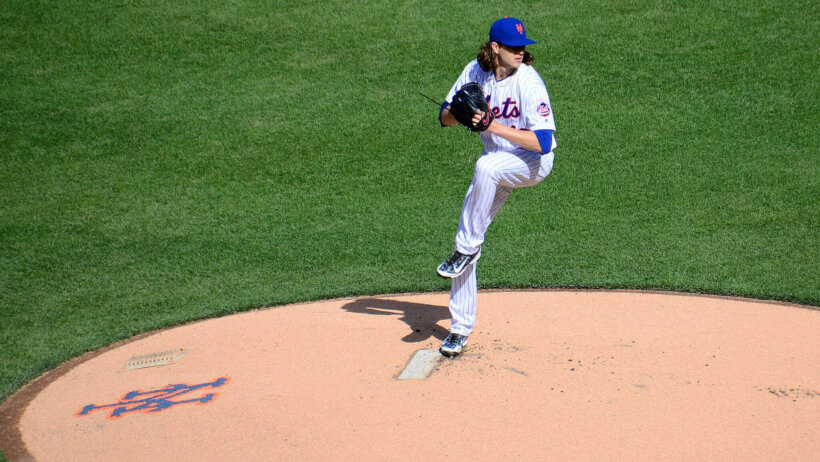 Jacob deGrom throwing a pitch