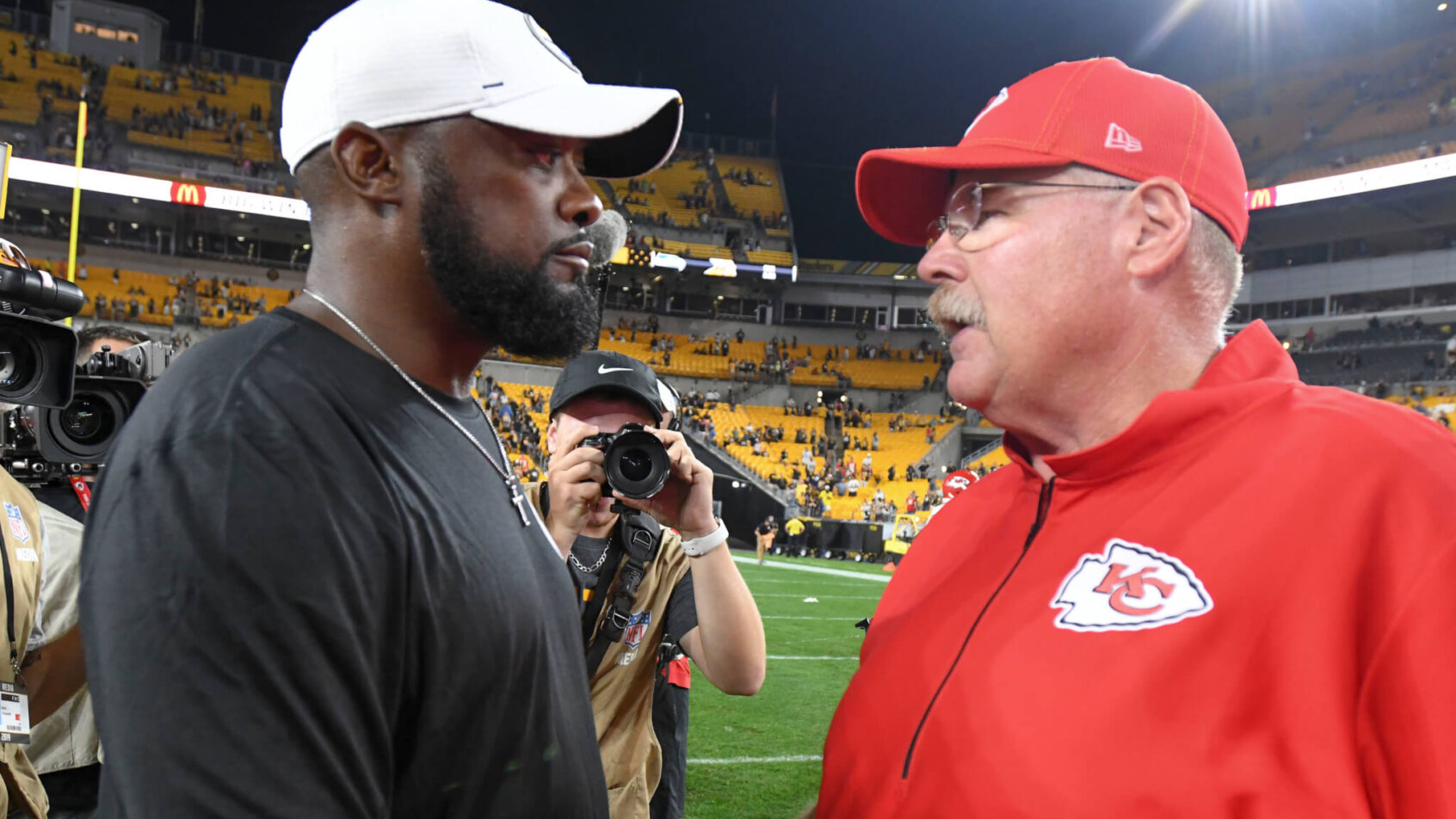 Pittsburgh Steelers head coach Mike Tomlin talking with Kansas City Chiefs head coach Andy Reid after a game.