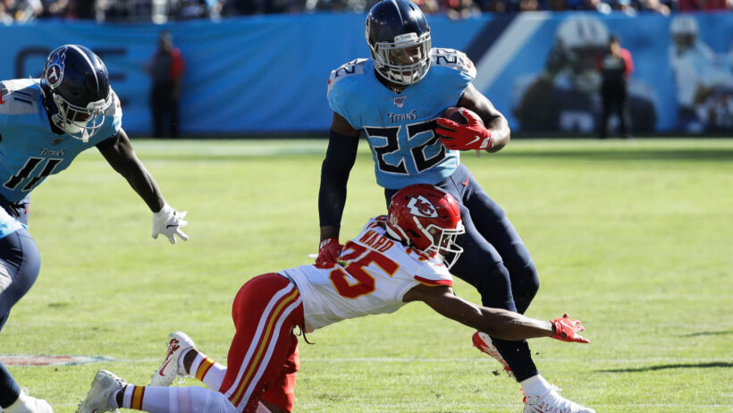 Derrick Henry running through tackle