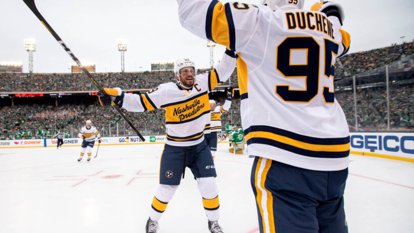 Predators players celebrate goal