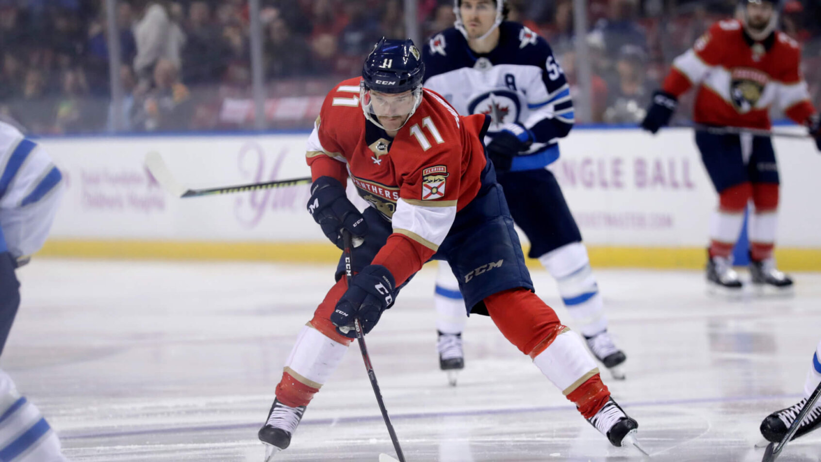 Jonathan Huberdeau skating with puck