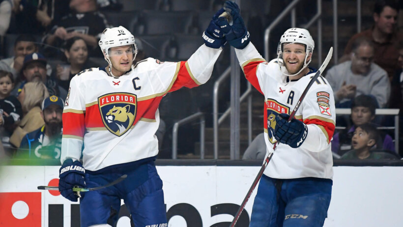 Aleksander Barkov celebrates his goal with Jonathan Huberdeau