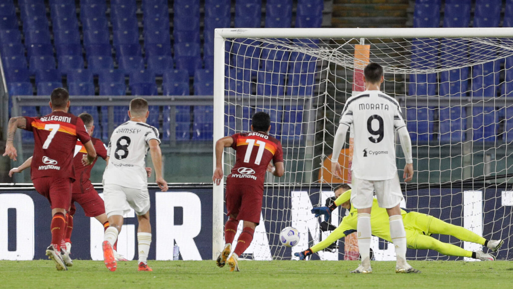 Roma shot going past diving goalie