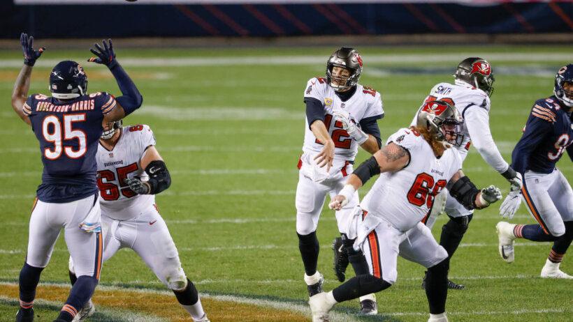 Tom Brady throwing a pass