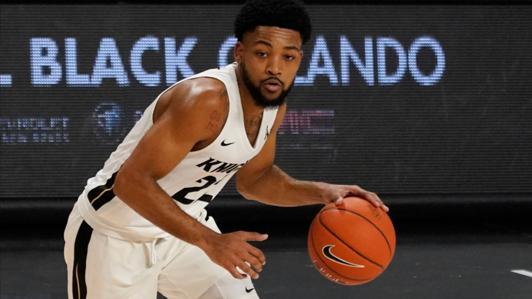 Darin Green Jr. dribbles the ball