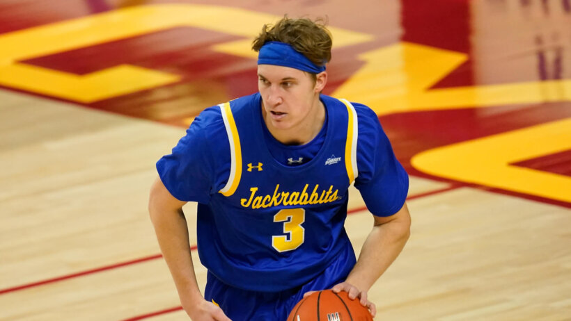 South Dakota State guard Baylor Scheierman dribbling up the court