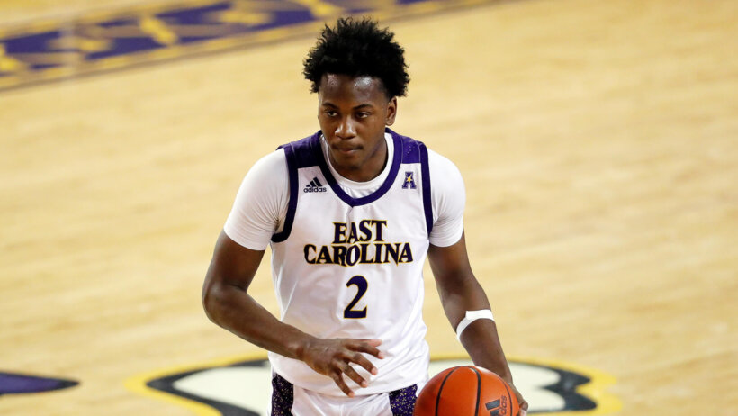 East Carolina's Tristen Newton dribbling up the court