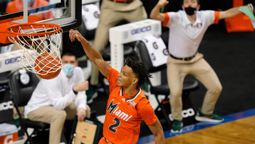 Miami guard Isaiah Wong dunking