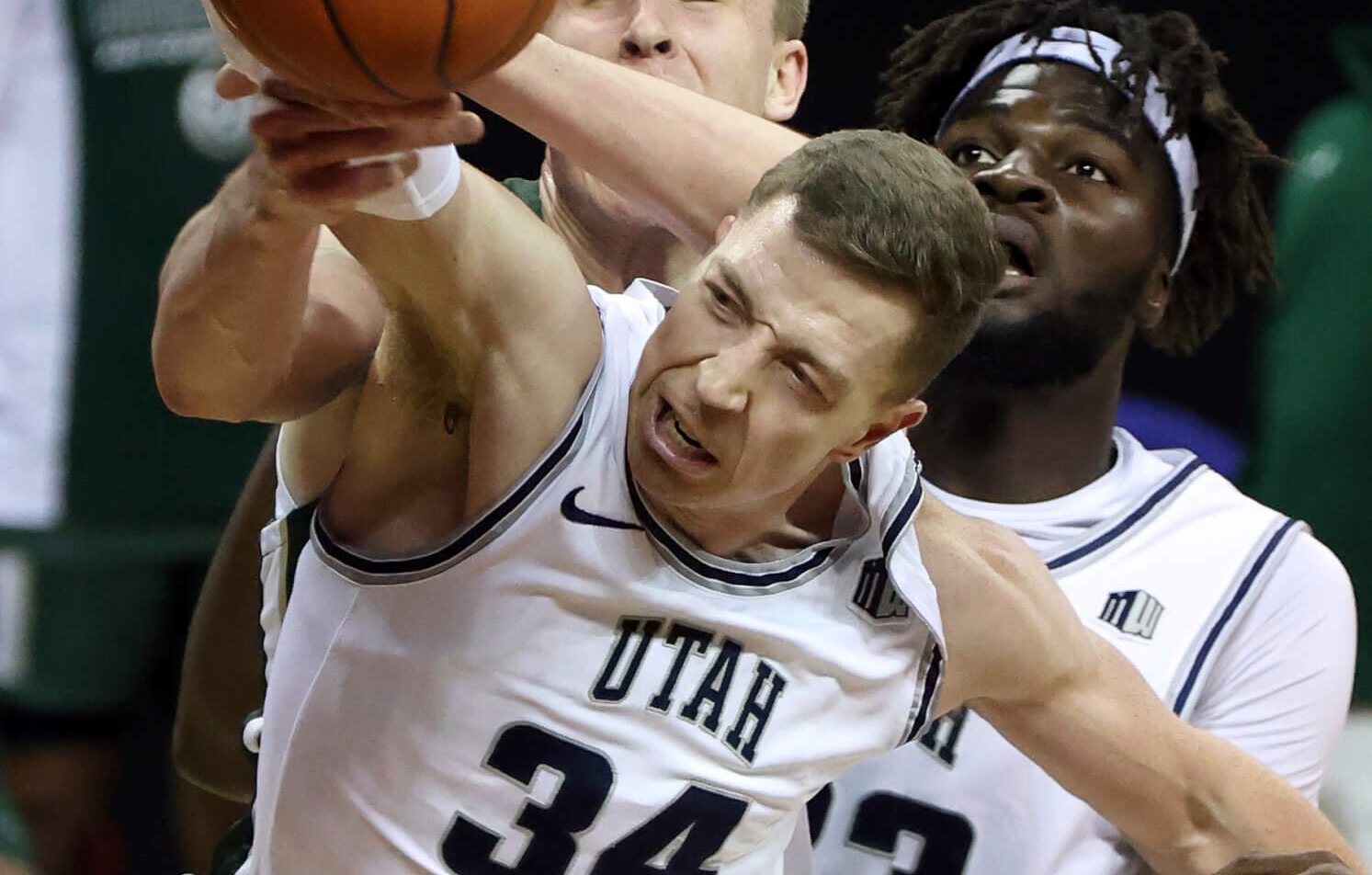 Utah State forward Justin Bean grabbing a rebound