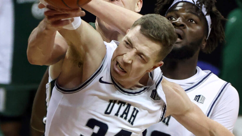 Utah State forward Justin Bean grabbing a rebound