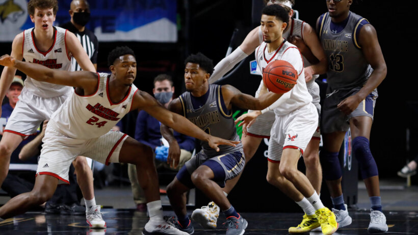 Montana State guard Xavier Bishop going after the ball