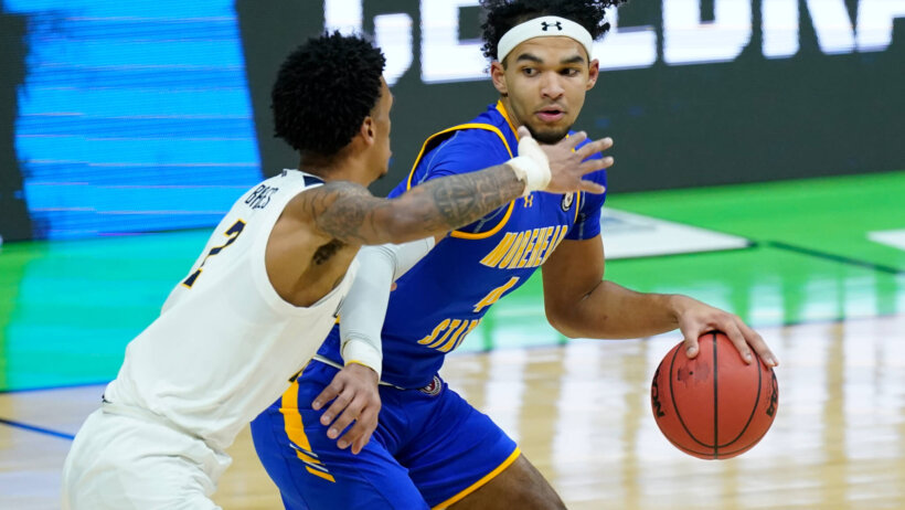 Morehead State's Johni Broome shielding the ball from a defender