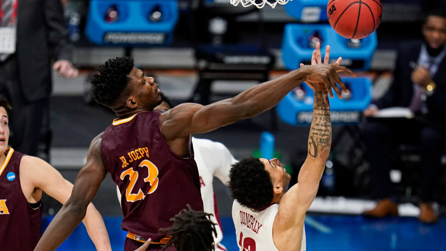 Iona forward Nelly Junior Joseph blocking a shot