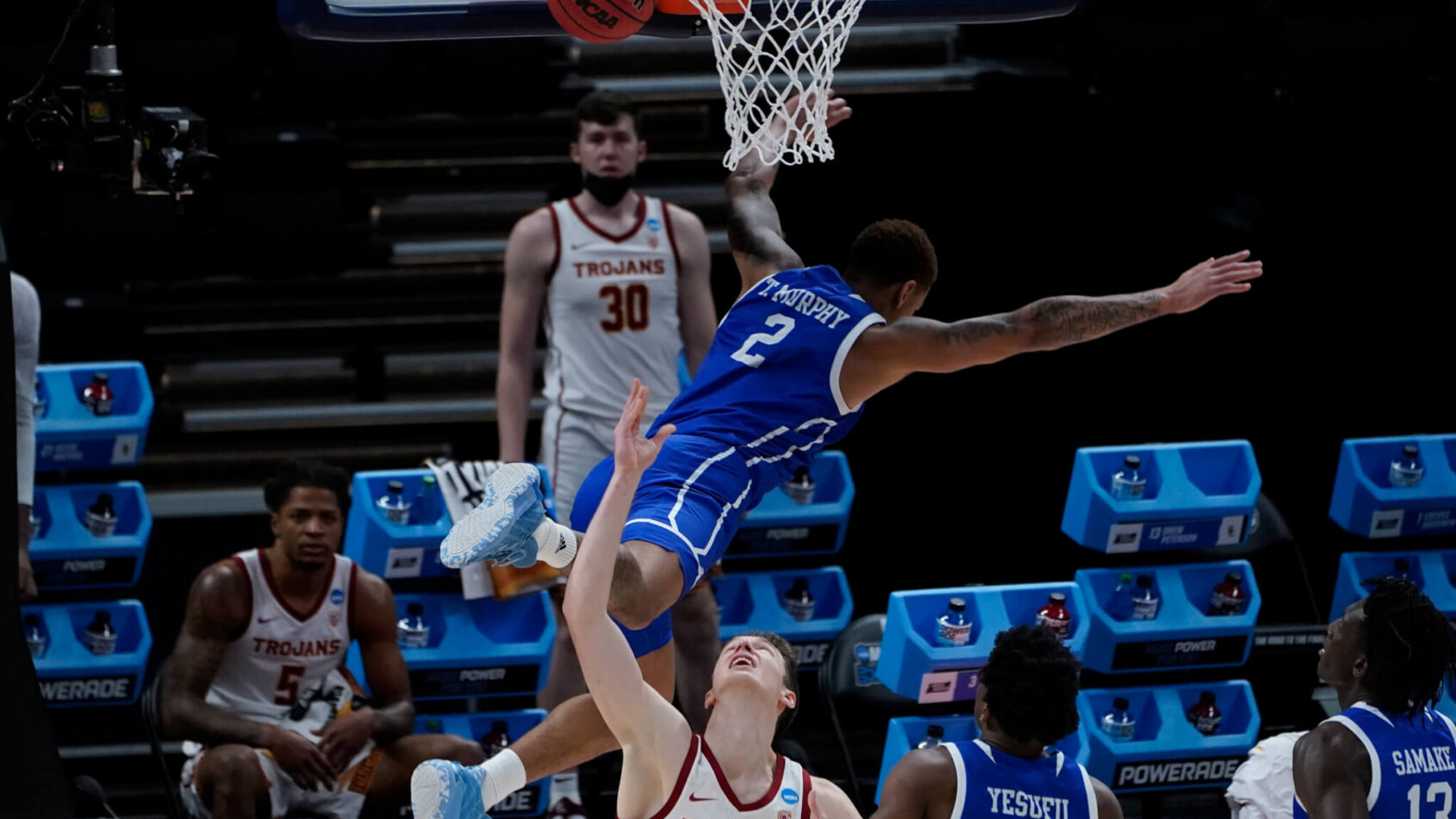 Drake forward Tremell Murphy defending