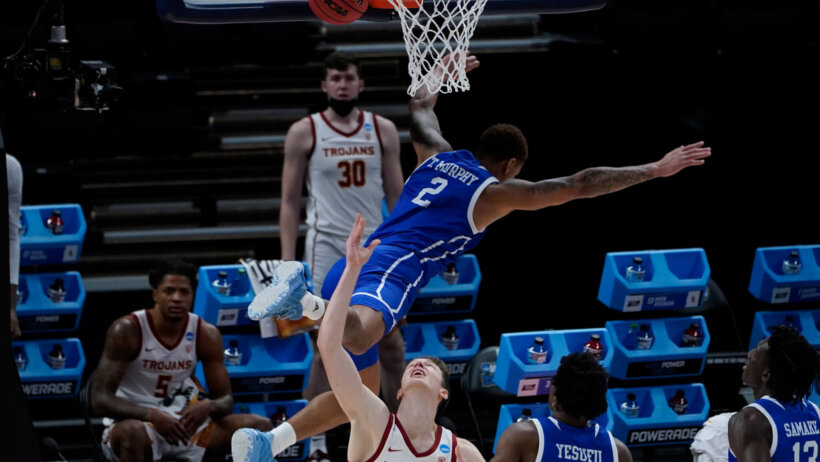 Drake forward Tremell Murphy defending