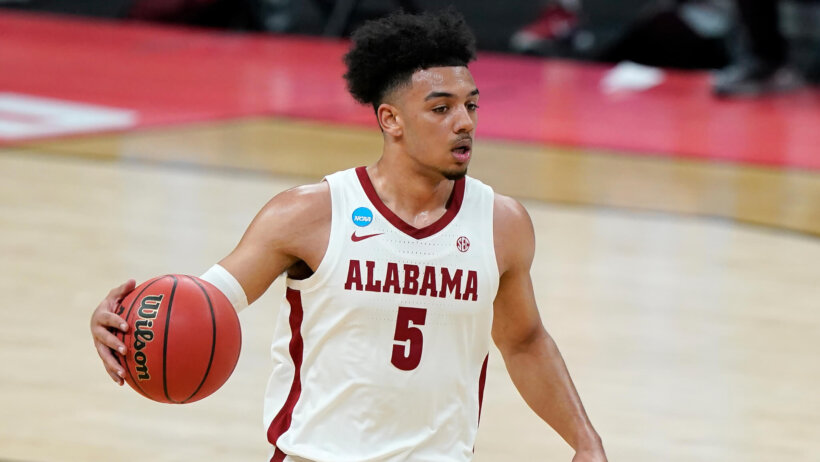 Alabama's Jaden Shackelford dribbling