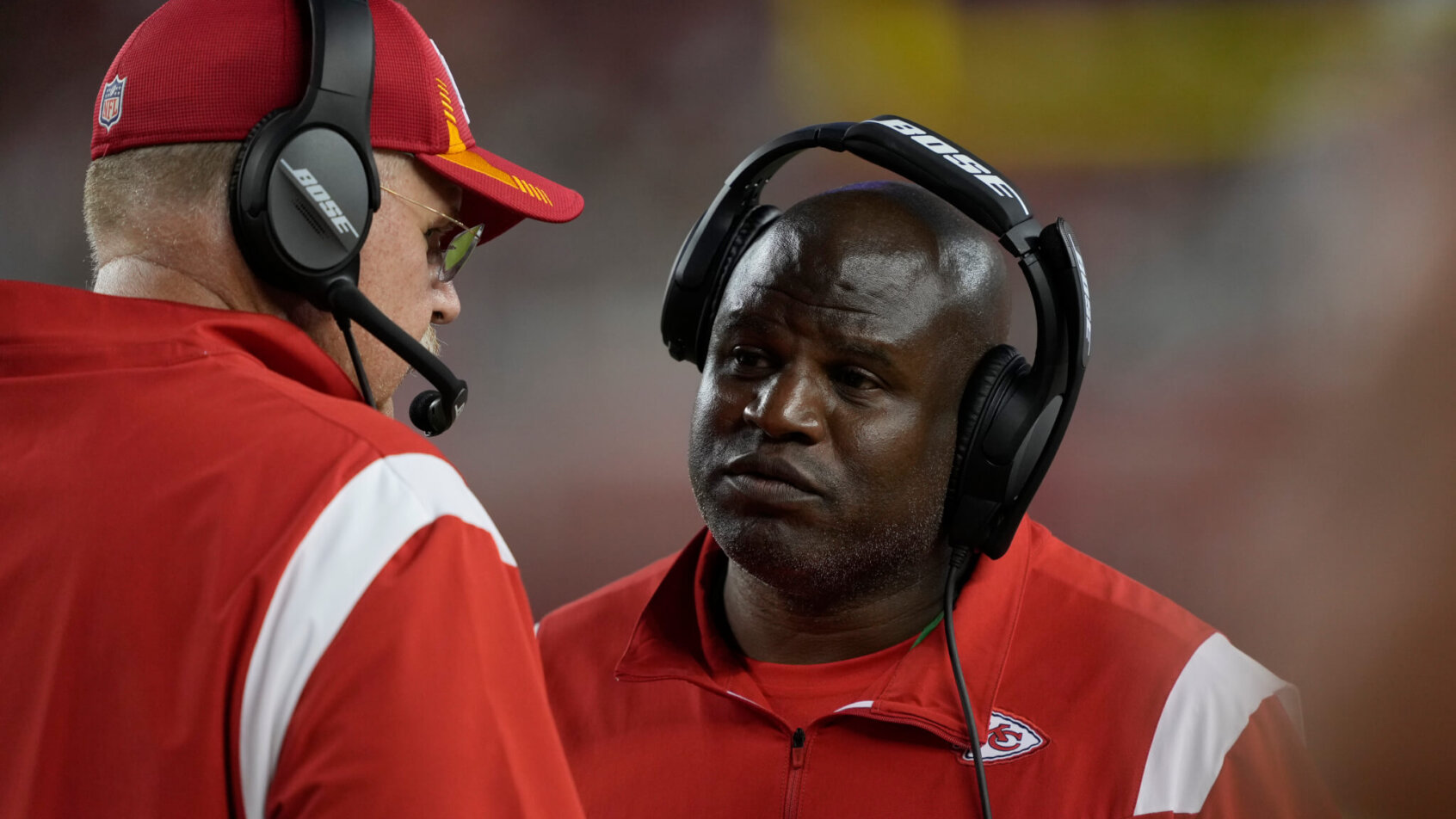 Eric Bieniemy talking to Andy Reid