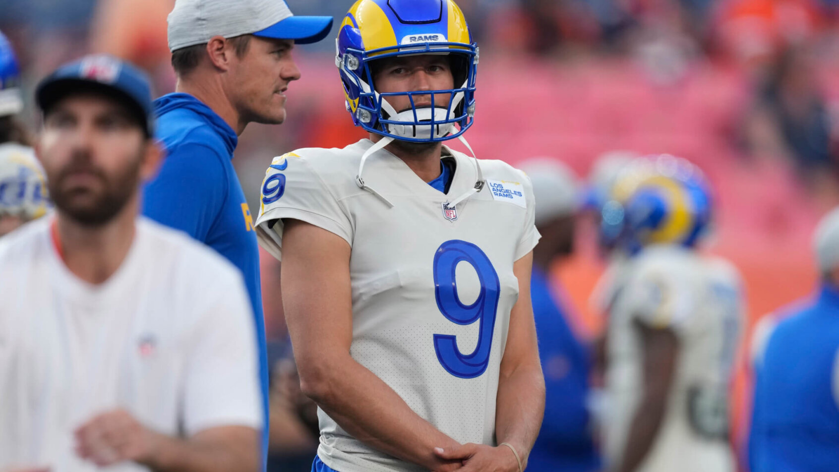 Matt Stafford standing on the sidelines