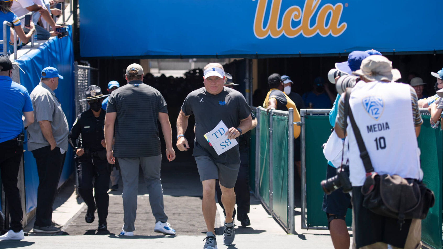 Chip Kelly running