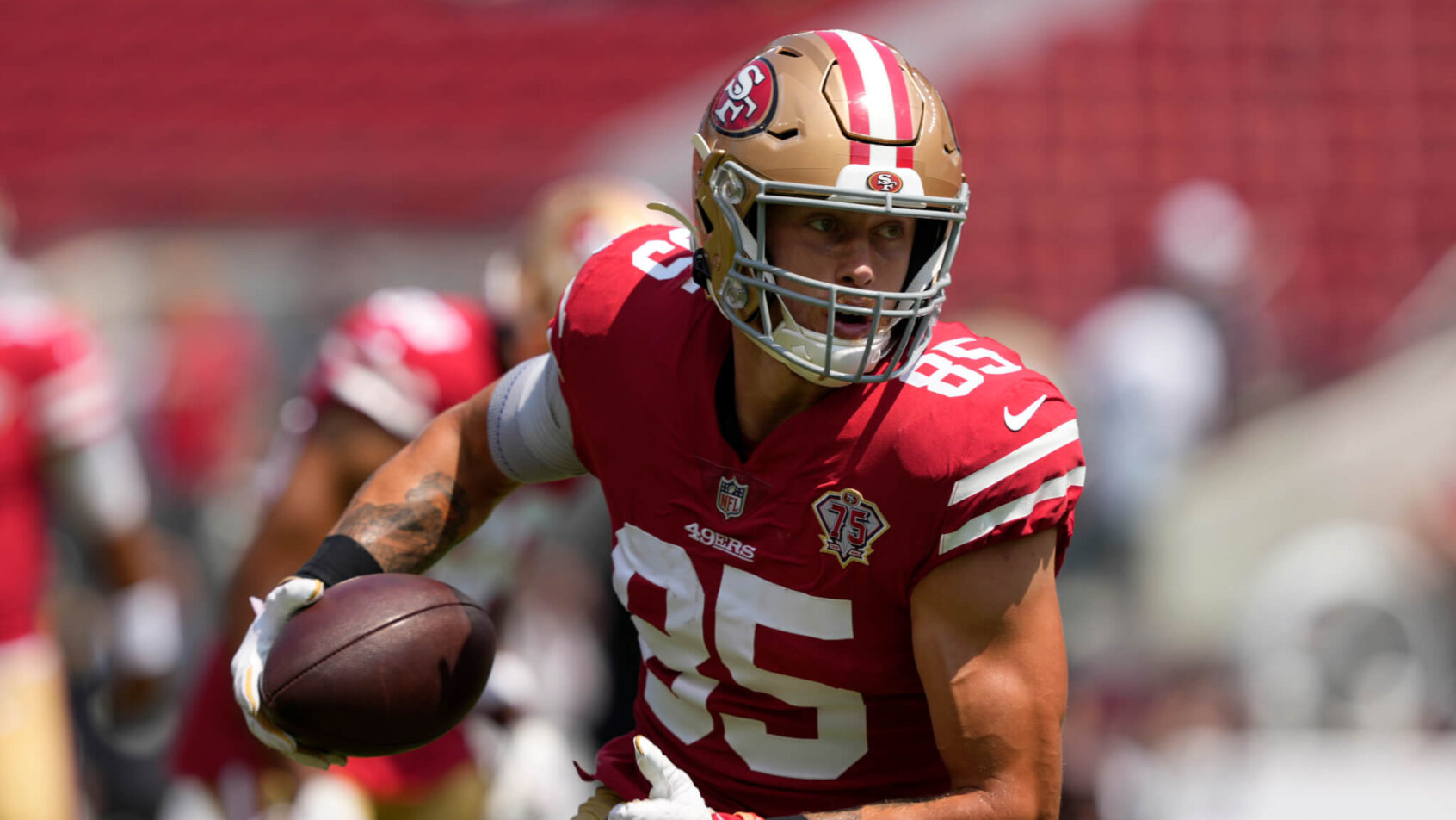 George Kittle turns up field