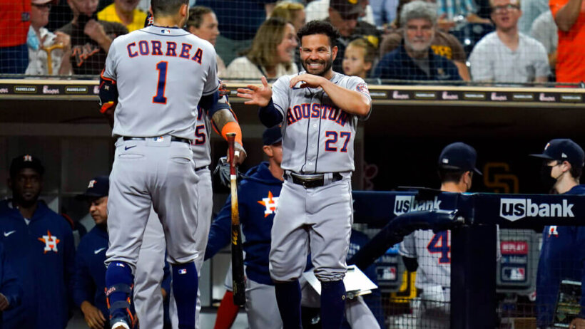 Houston Astros' Carlos Correa celebrates with Jose Altuve