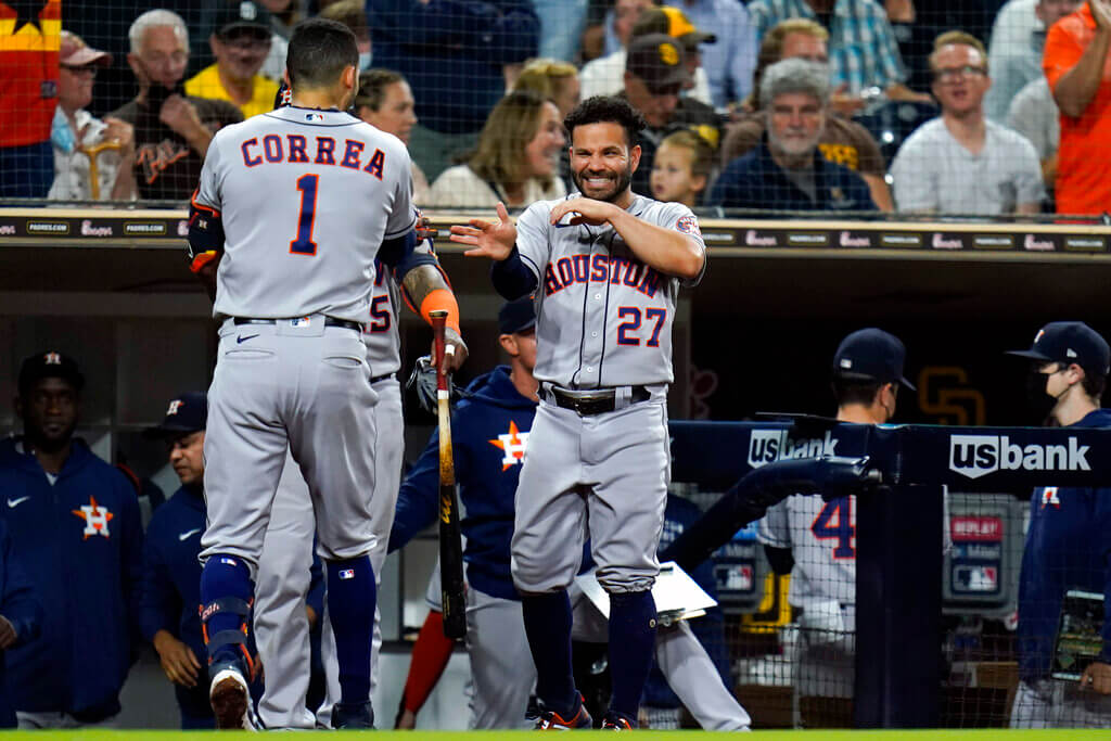 Houston Astros' Carlos Correa celebrates with Jose Altuve