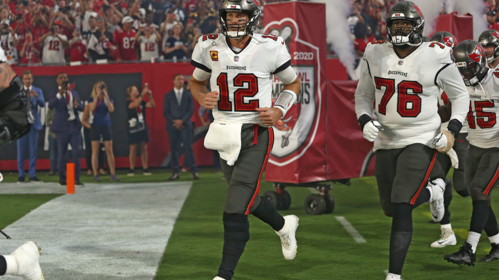 Tampa Bay Buccaneers running onto field
