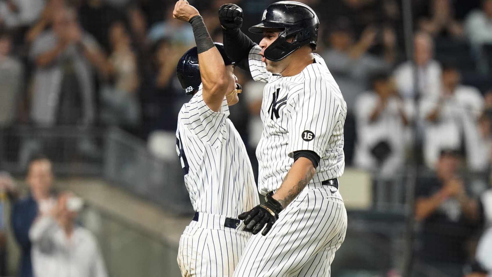 Gary Sanchez celebrating a home with Gio Urshela