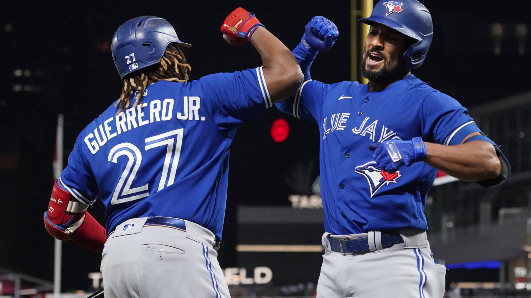 Marcus Semien and Vladimir Guerrero Jr. smash elbows