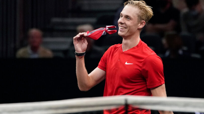 Denis Shapovalov holding headband