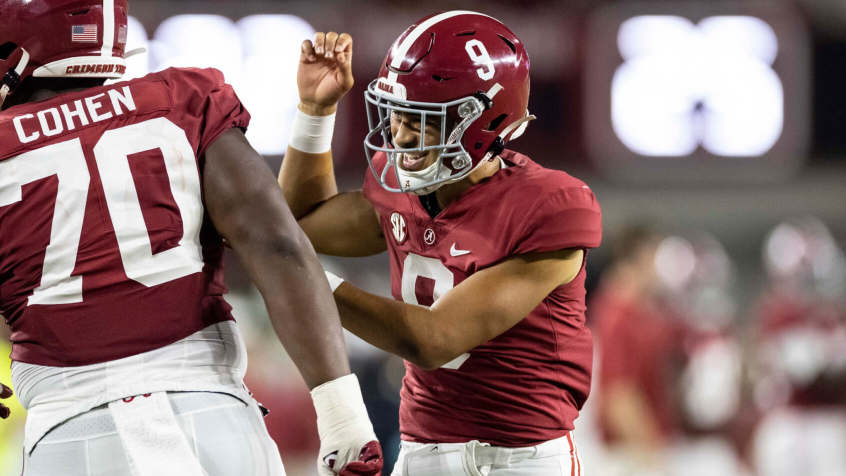 Bryce Young celebrates with teammates