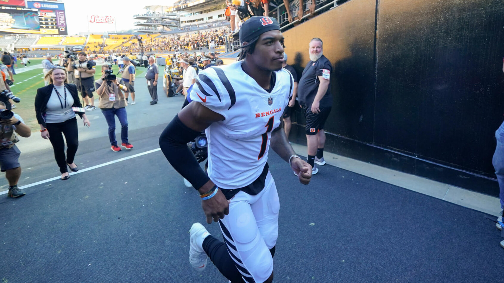 Cincinnati Bengals wide receiver Ja'Marr Chase jogging to the locker room