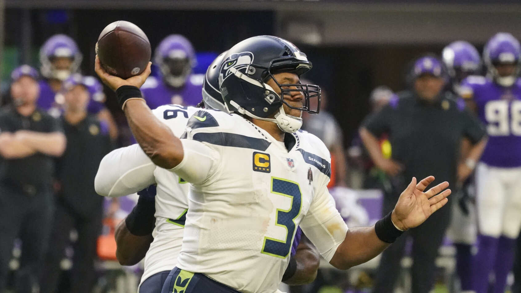 Russell Wilson delivers a throw
