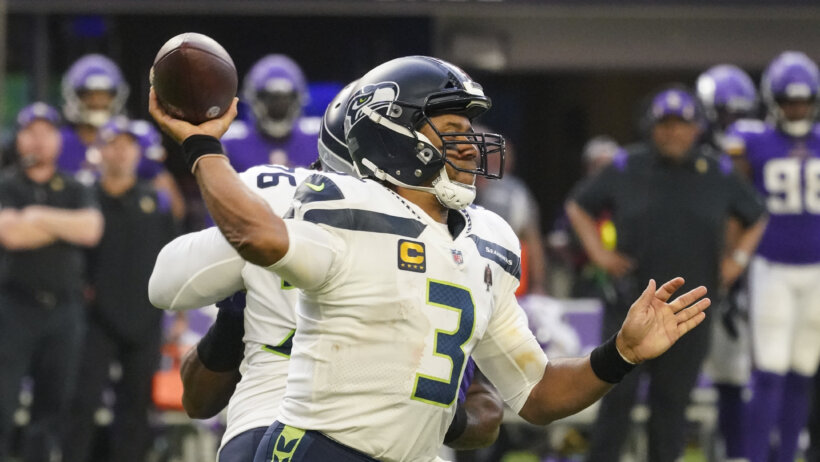 Russell Wilson delivers a throw