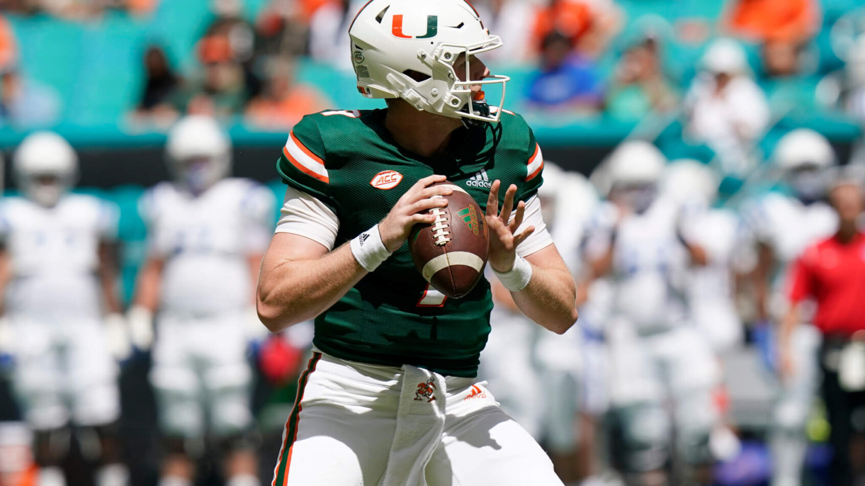 Tyler Van Dyke scans the defense