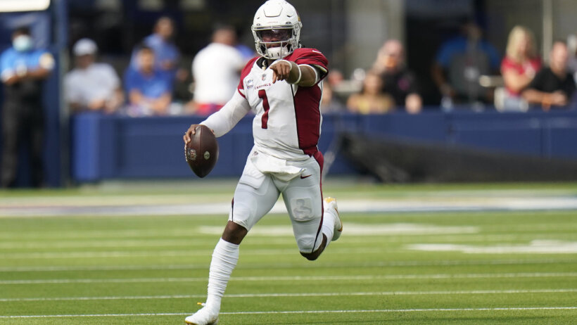 Kyler Murray running and pointing
