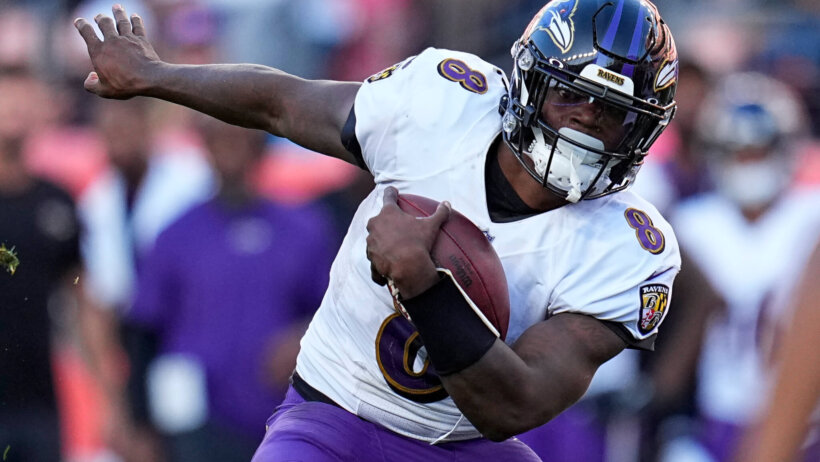 Lamar Jackson running with ball