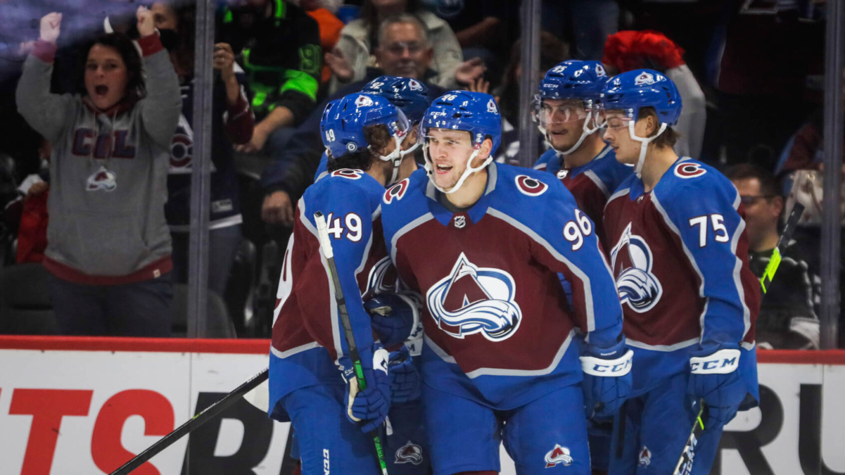 Avs players celebrate goal