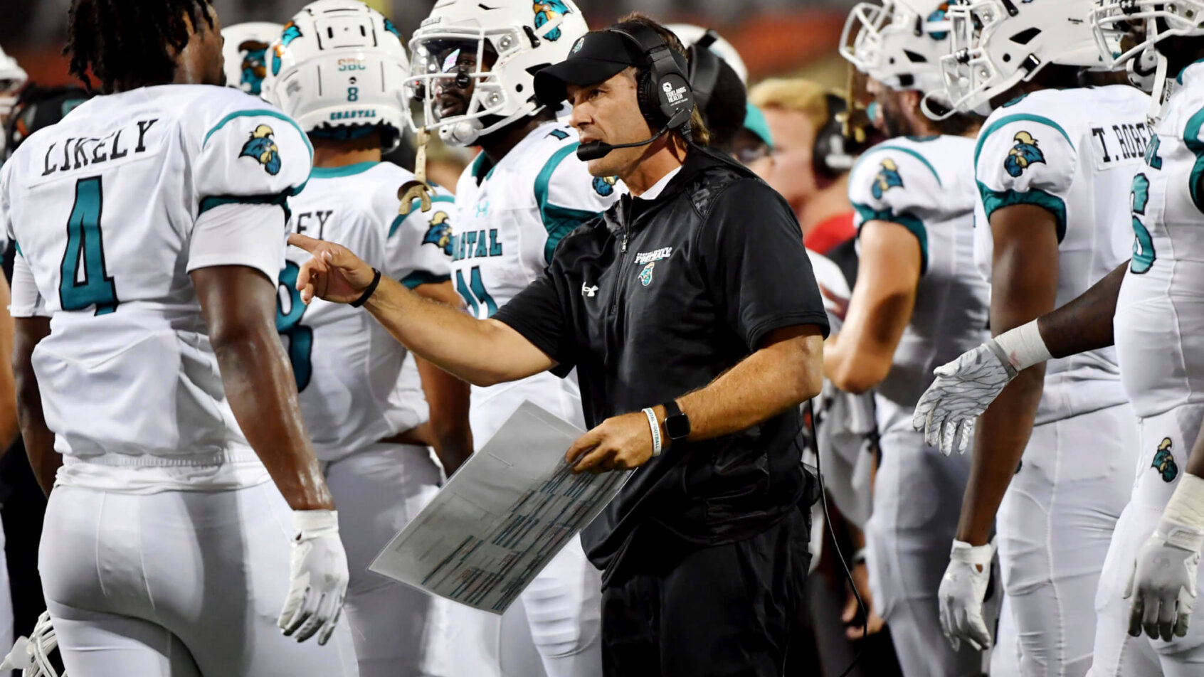 Coastal football huddle