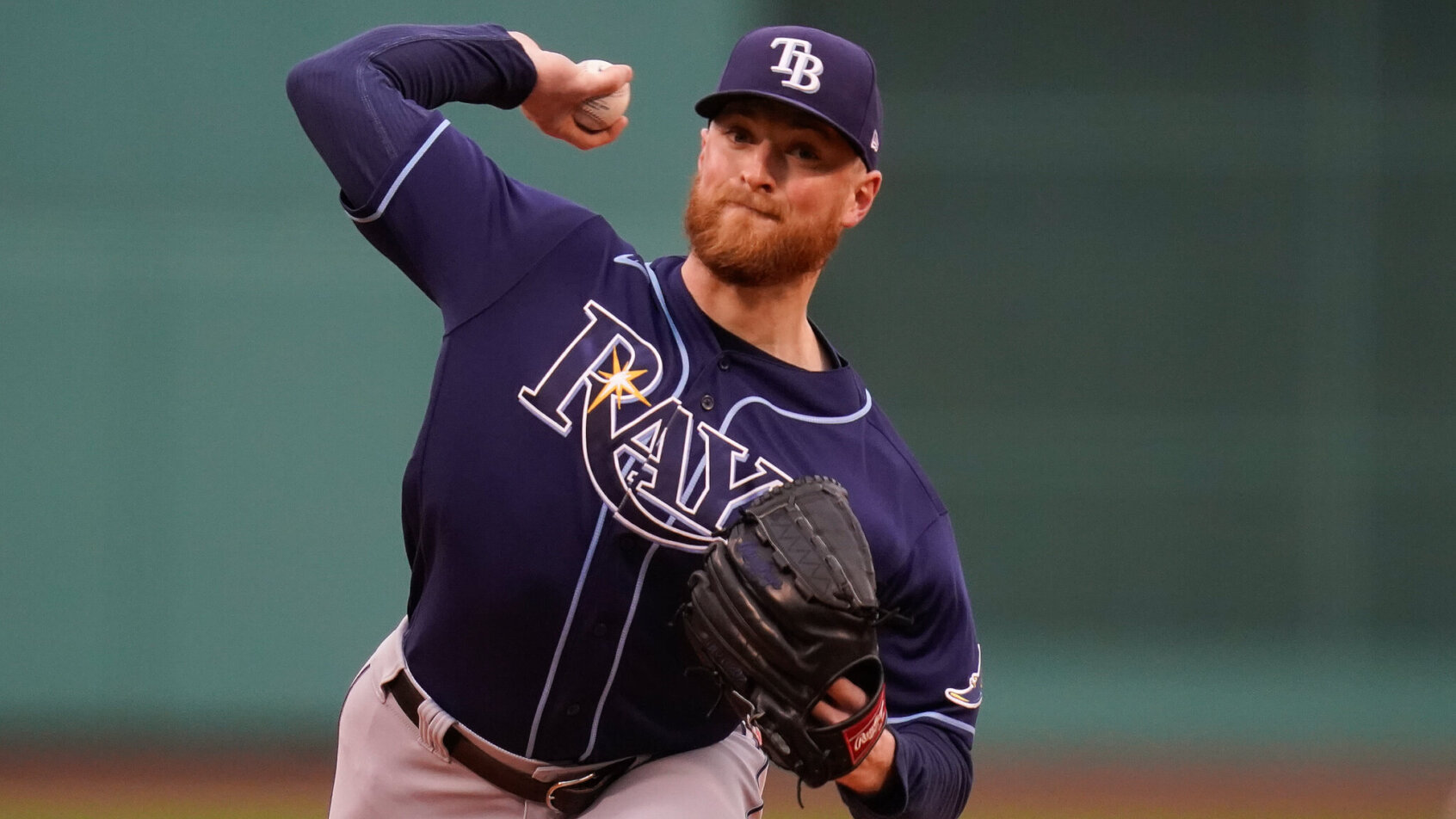 Tampa Bay Rays pitcher Drew Rasmussen throwing a pitch during a MLB game.