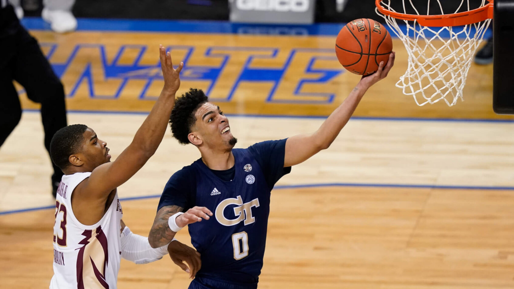 Michael Devoe going for a layup